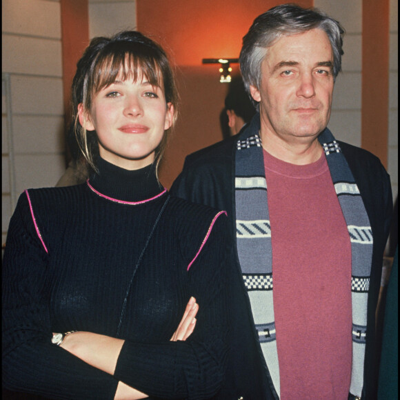 Un réalisateur avec qui elle sera restée en couple pendant 17 ans.
Sophie Marceau et Andrzej Zulawski - Inauguration de l'hôtel Marignan à Paris le 14 janvier 1992