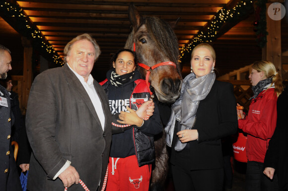 Gerard Depardieu et sa fille Roxane, Kathrin Glock - Gerard Depardieu assiste a l'ouverture du marche de Noel "Gut Aiderbichl" en Henndorf en Autriche le 14 novembre 2013. 