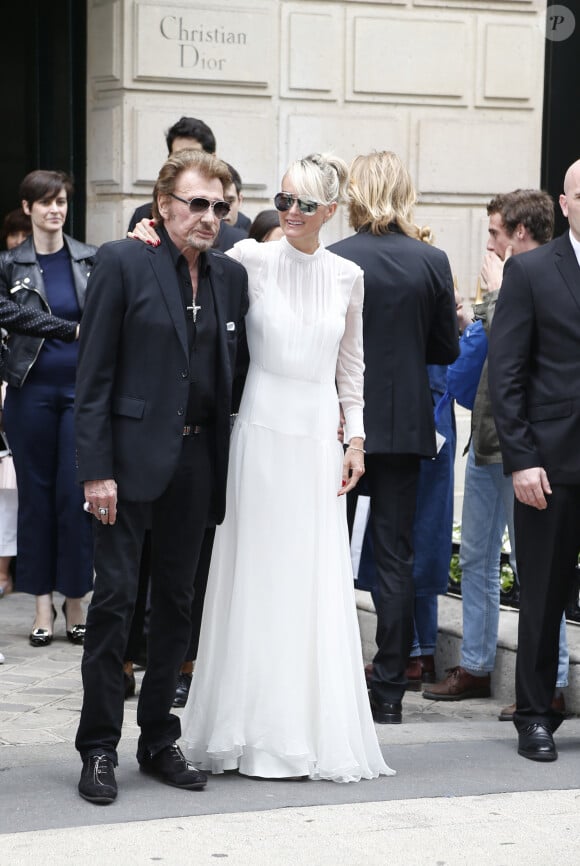 Johnny Hallyday et sa femme Laeticia - Arrivées au défilé de mode Haute-Couture automne-hiver 2016/2017 "Christian Dior" à Paris. Le 4 juillet 2016 