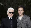 L'histoire veut même que, chez lui, le noir domine... pour une excellente raison.
Karl Lagerfeld et Baptiste Giabiconi - Défilé de mode Chanel haute-couture printemps ete 2013 au Grand Palais a Paris. Le 22 janvier 2013.