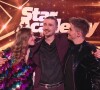 Il faut désormais se battre pour avoir le droit à une place dans le public !
Helena, Pierre et Julien - Demi-finale de l'émission "Star Academy" sur TF1.