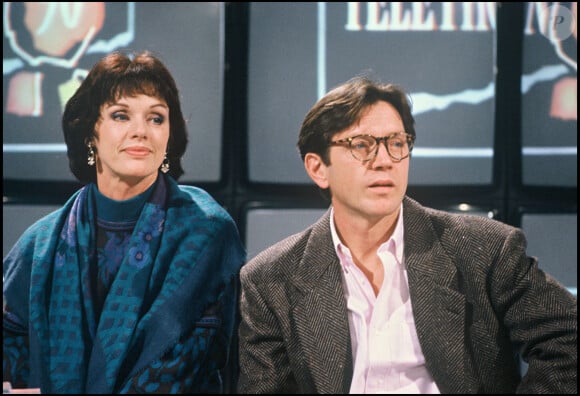 Bernard Giraudeau et Anny Duperey au Téléthon le 9 décembre 1990