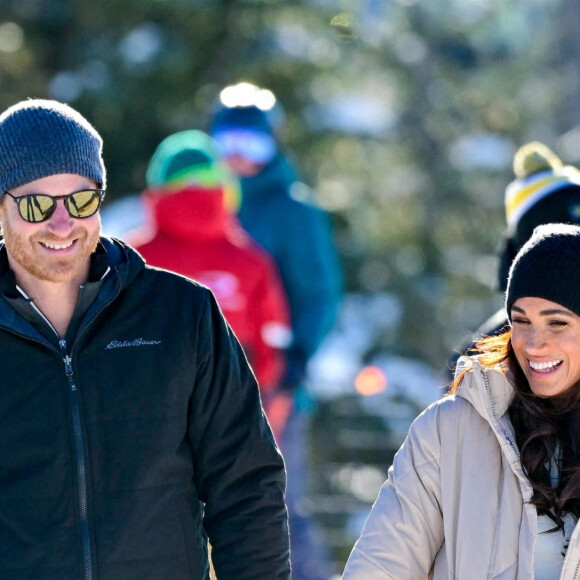 Le prince Harry, duc de Sussex et Meghan Markle, duchesse de Sussex, en visite au camp d'entrainement des athlètes des Invictus Games 2024 à Whistler en Colombie Britannique, le 14 février 2024. 