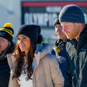 Le prince Harry, duc de Sussex et Meghan Markle, duchesse de Sussex, en visite au camp d'entrainement des athlètes des Invictus Games 2024 à Whistler en Colombie Britannique, le 14 février 2024. 