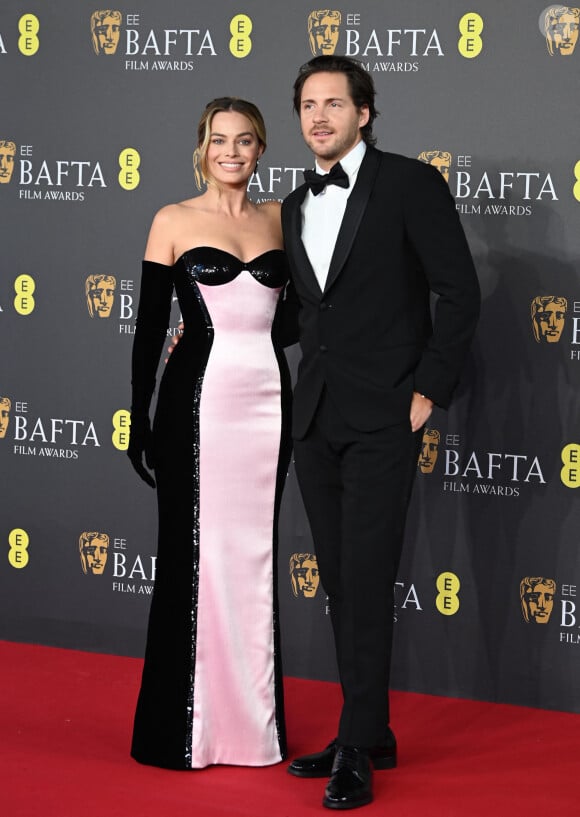 A quelques jours des Oscars, le septième art a brillé du côté du Royaume Uni.
Margot Robbie et son compagnon Tom Ackerley - Cérémonie des British Academy Film Awards au Royal Festival Hall de Londres.