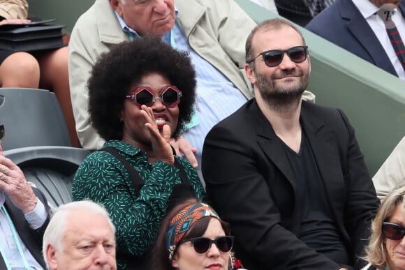 Claudia Tagbo et son compagnon dans les tribunes des internationaux de tennis de Roland Garros à Paris, France, le 5 juin 2018. © Dominique Jacovides - Cyril Moreau/Bestimage 