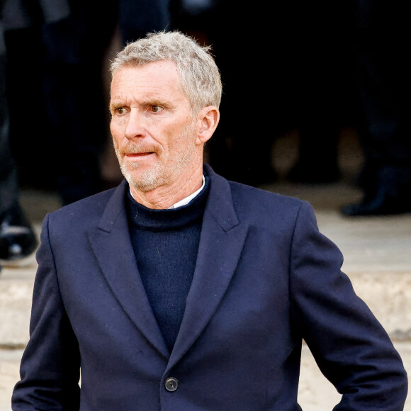 Denis Brogniart - Sorties des obsèques de Jean-Pierre Pernaut en la Basilique Sainte-Clotilde à Paris, France, le 9 mars 2022. © Cyril Moreau/Bestimage 