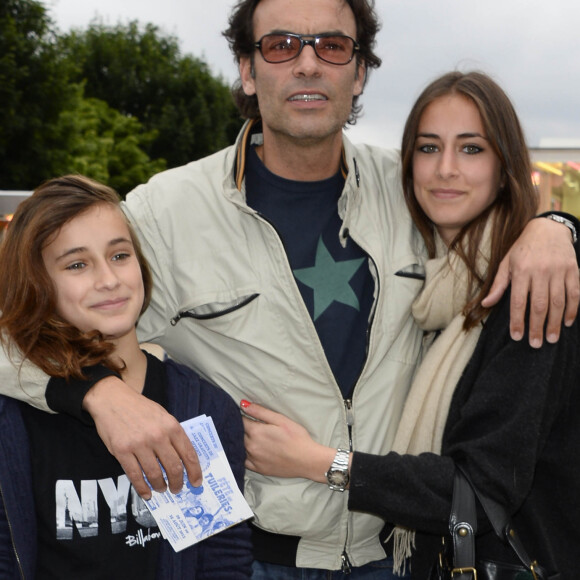 Anthony Delon avec ses filles Liv et Loup - Inauguration de la fete foraine des Tuileries a Paris le 28 juin 2013.