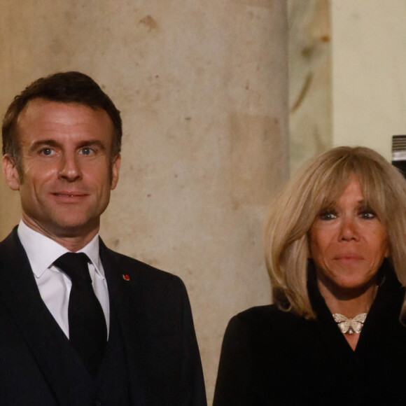 Emmanuel Macron et sa femme Brigitte Macron - E. Macron, président de la république française et sa femme B. Macron reçoivent G. Nauseda, président de la république de Lituanie et sa femme Diana Nausediene à l'occasion d'un dîner en leur honneur au Palais de l'Elysée à Paris, France, le 12 mars 2024. © Christophe Clovis / Bestimage 