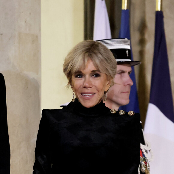 Brigitte Macron et son altesse Tamim ben Hamad Al Thani, emir du Qatar - Arrivées au dîner d'état en l'honneur de l'Emir du Qatar au palais présidentiel de l'Elysée à Paris le 27 février 2024. © Dominique Jacovides / Bestimage 