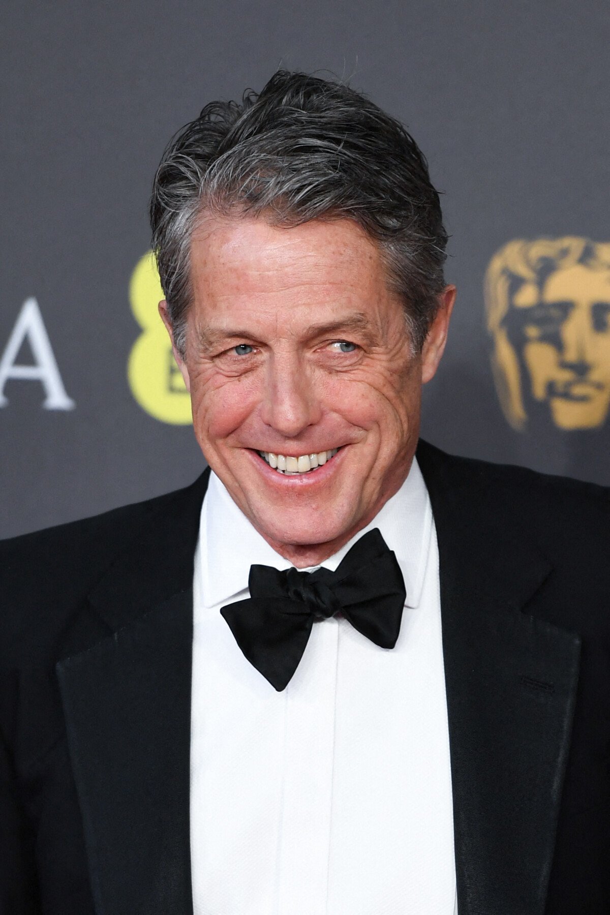 Photo : Hugh Grant au BAfta à Londres le 18 février 2024. Photo by ...