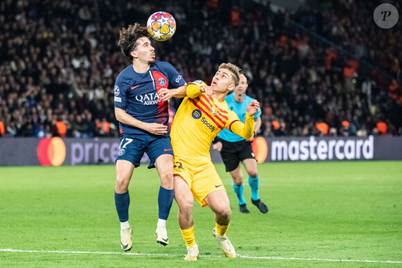 Vitinha (Paris SG) Fermin Lopez (FC Barcelone) - Quart de finale aller de Ligue des champions: Le PSG s'est incliné à domicile face au FC Barcelone (2-3) au Parc des Princes à Paris le 10 avril 2024.