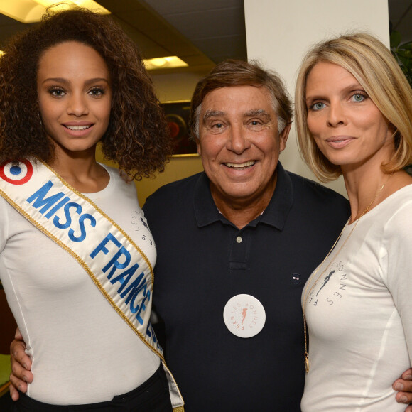 Alicia Aylies (Miss France 2017) , Jean-Pierre Foucault et Sylvie Tellier lors de la 13ème édition du Charity Day dans la salle des marchés d'Aurel BGC dans le quartier de la Bourse à Paris le 11 septembre 2017. © Veeren / Bestimage