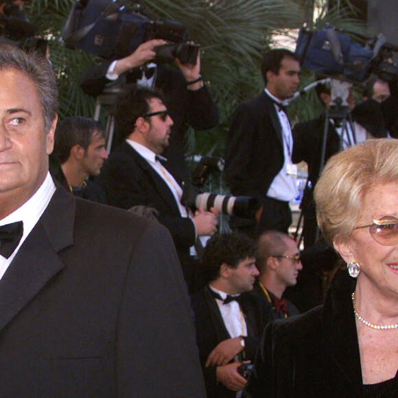 Roger Hanin et son épouse Christine Gouze-Rénal au 52ème Festival de Cannes. Serge Haouzi/Nice Matin/ABACA. 12790-21. Cannes, 15 mai 1999.