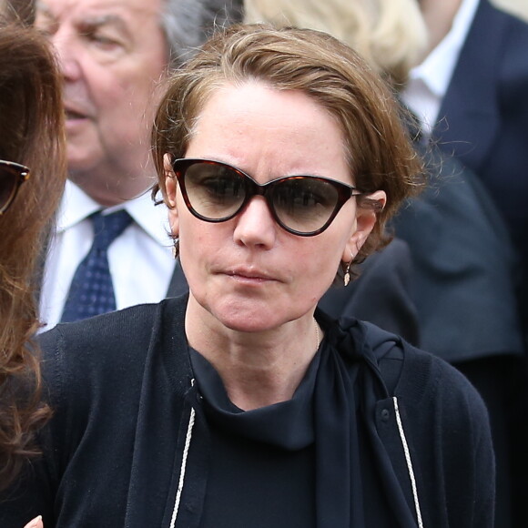 Cendrine Dominguez - Sorties des obsèques de Patrice Dominguez en la basilique Sainte Clotilde à Paris. Le 16 avril 2015