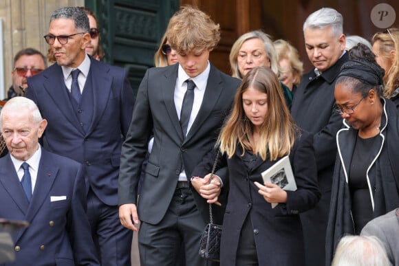 Roschdy Zem, Roman Lavoine et sa cousine Tess Rambaldi (fille de Marie Poniatowski et petite-fille du défunt) - Sorties des obsèques du prince Jean-Stanislas Poniatowski en l'Eglise polonaise à Paris, France, le 29 avril 2024. © Jacovides-Moreau/Bestimage