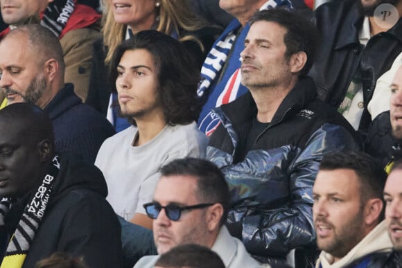 Richard Orlinski et son fils Julien - Célébrités dans les tribunes de la demi-finale retour de Ligue des champions entre le PSG face au Borussia Dortmund (0-1) au Parc des Princes à Paris le 7 mai 2024. © Cyril Moreau/Bestimage