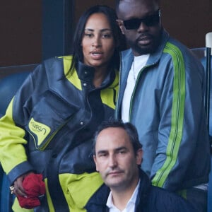 Gims et sa femme Demdem - Célébrités dans les tribunes de la demi-finale retour de Ligue des champions entre le PSG face au Borussia Dortmund (0-1) au Parc des Princes à Paris le 7 mai 2024. © Cyril Moreau/Bestimage