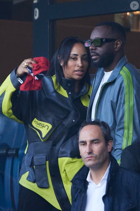 Gims et sa femme Demdem - Célébrités dans les tribunes de la demi-finale retour de Ligue des champions entre le PSG face au Borussia Dortmund (0-1) au Parc des Princes à Paris le 7 mai 2024. © Cyril Moreau/Bestimage