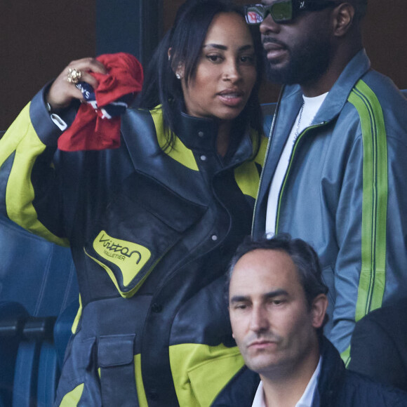Gims et sa femme Demdem - Célébrités dans les tribunes de la demi-finale retour de Ligue des champions entre le PSG face au Borussia Dortmund (0-1) au Parc des Princes à Paris le 7 mai 2024. © Cyril Moreau/Bestimage