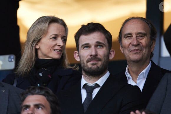 Xavier Niel et sa compagne Delphine Arnault - Célébrités dans les tribunes de la demi-finale retour de Ligue des champions entre le PSG face au Borussia Dortmund (0-1) au Parc des Princes à Paris le 7 mai 2024. © Cyril Moreau/Bestimage