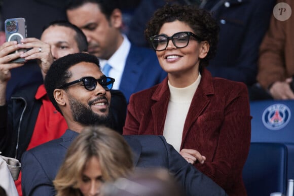 Nawell Madani et son compagnon Djebril Didier Zonga - Célébrités dans les tribunes de la demi-finale retour de Ligue des champions entre le PSG face au Borussia Dortmund (0-1) au Parc des Princes à Paris le 7 mai 2024. © Cyril Moreau/Bestimage