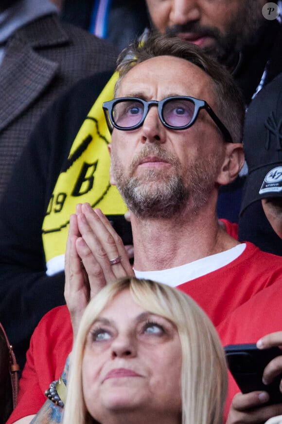 Philippe Caverivière - Célébrités dans les tribunes de la demi-finale retour de Ligue des champions entre le PSG face au Borussia Dortmund (0-1) au Parc des Princes à Paris le 7 mai 2024. © Cyril Moreau/Bestimage