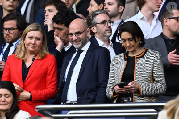 Yael Braun Pivet, Victoriano Melero et Amelie Oudea Castera dans les tribunes de la demi-finale retour de Ligue des champions entre le PSG face au Borussia Dortmund (0-1) au Parc des Princes à Paris le 7 mai 2024.