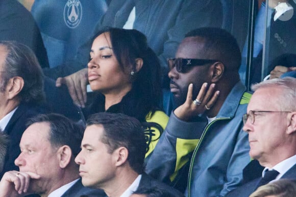 Gims et sa femme Demdem - Célébrités dans les tribunes de la demi-finale retour de Ligue des champions entre le PSG face au Borussia Dortmund (0-1) au Parc des Princes à Paris le 7 mai 2024. © Cyril Moreau/Bestimage