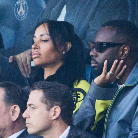 Gims et sa femme Demdem - Célébrités dans les tribunes de la demi-finale retour de Ligue des champions entre le PSG face au Borussia Dortmund (0-1) au Parc des Princes à Paris le 7 mai 2024. © Cyril Moreau/Bestimage