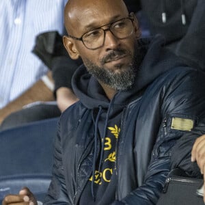 Nicolas Anelka - People au match de football ligue 1 Uber Eats PSG - Montpellier (2-0) au Parc des Princes à Paris le 25 septembre 2021 