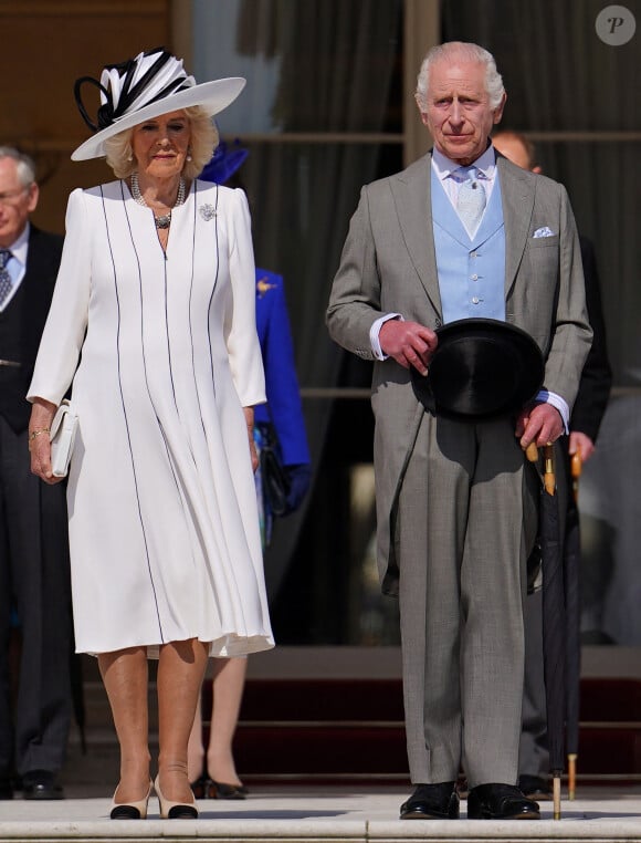 La femme du roi Charles III a fait une grande annonce
 
Le roi Charles III d'Angleterre et Camilla Parker Bowles, reine consort d'Angleterre, reçoivent des invités lors d'une Garden Party à Buckingham Palace à Londres, le 8 mai 2024.