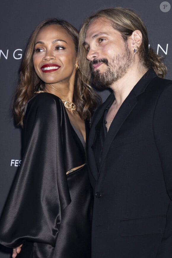 Marco Perego et sa femme Zoe Saldana - Photocall du dîner "Women in Motion" par le groupe Kering, Place de la Castre, lors du 77ème Festival International du Film de Cannes le 19 mai 2024. © Olivier Borde/Bestimage