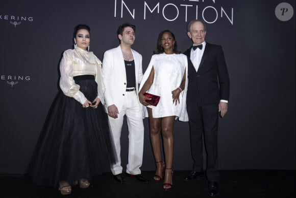 Asmae El Moudir, Xavier Dolan, Maimouna Doucoure, Todd McCarthy - Photocall du dîner "Women in Motion" par le groupe Kering, Place de la Castre, lors du 77ème Festival International du Film de Cannes le 19 mai 2024. © Olivier Borde/Bestimage