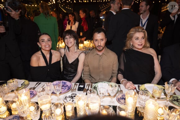 Elodie Bouchez, Charlotte Gainsbourg, Anthony Vaccarello, Catherine Deneuve - Personnalités au dîner "Women in Motion" par le groupe Kering, Place de la Castre, lors du 77ème Festival International du Film de Cannes. Le 19 mai 2024 © Olivier Borde / Bestimage