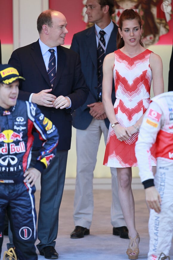 Le Prince Albert II et Charlotte assistent à la cérémonie de remise des prix avec Sebastien Vettel, Fernando Alonso, Janson Button lors du Grand Prix de Formule 1 de Monaco au Circuit de Monte Carlo à Monte Carlo, Monaco le 29 mai 2011. Photo par Marco Piovanotto/ABACAPRESS.COM