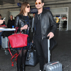 Adèle Exarchopoulos et Jérémie Laheurte - Arrivées des people à l'aéroport de Nice pour le 67ème festival du film de Cannes. Le 14 mai 2014 