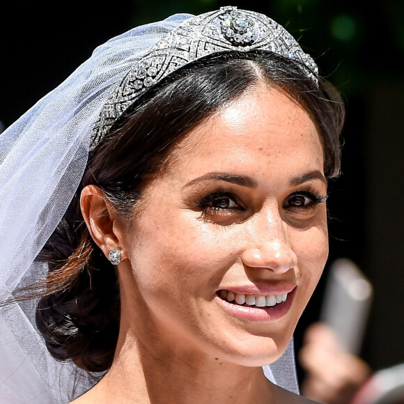 Le prince Harry, duc de Sussex, et Meghan Markle, duchesse de Sussex, en calèche à la sortie du château de Windsor après leur mariage le 19 mai 2018 