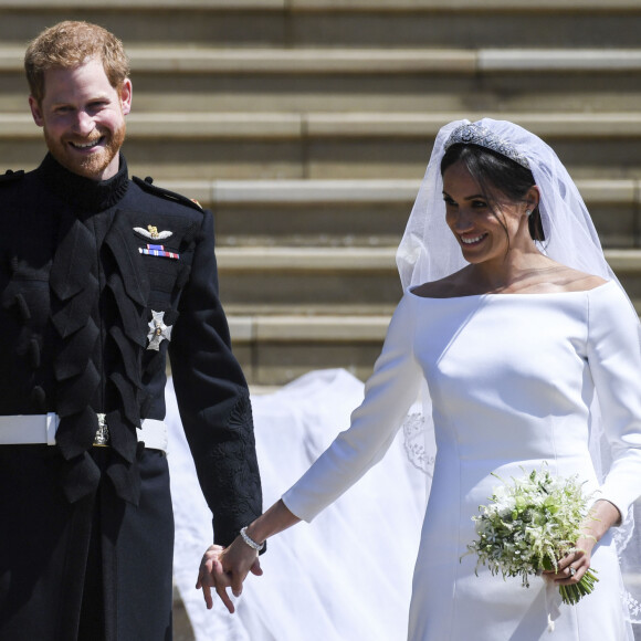 Un jour de fête que personne n'a oublié ! 
Le prince Harry, duc de Sussex, et Meghan Markle, duchesse de Sussex, à la sortie de chapelle St. George au château de Windsor - Sortie après la cérémonie de mariage du prince Harry et de Meghan Markle en la chapelle Saint-George au château de Windsor, Royaume Uni.