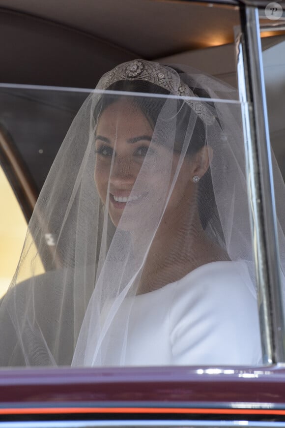 Meghan Markle, duchesse de Sussex arrive à la chapelle St. George au château de Windsor à bord d'une Rolls Royce - Mariage du prince Harry et de Meghan Markle au château de Windsor le 19 mai 2018. 