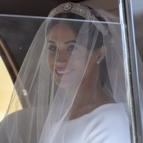Meghan Markle, duchesse de Sussex arrive à la chapelle St. George au château de Windsor à bord d'une Rolls Royce - Mariage du prince Harry et de Meghan Markle au château de Windsor le 19 mai 2018. 