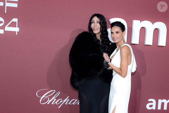 Cher et Demi Moore - Photocall du gala de l'amfAR 2024 à l'Hôtel du Cap-Eden-Roc, Antibes, lors du 77ème Festival International du Film de Cannes. Le 23 mai 2024. © Moreau-Jacovides / Bestimage 