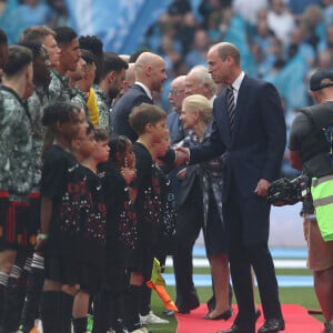 Le prince William, prince de Galles, et son fils le prince George de Galles, assistent à la finale de la coupe Emirates FA 2024 entre Manchester United et Manchester City au stade de Wembley à Londres, le 25 mai 2024.  Royal Highness the Prince of Wales, Prince William & his son Prince George of Wales at Wembley Stadium for The Emirates FA Cup Final 2024 between Manchester United v Manchester City. May 25th, 2024. 