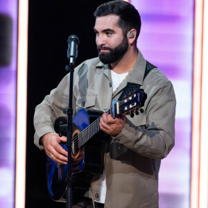 Heureusement, le chanteur a été opéré et sauvé, et suit depuis une longue convalescence loin des médias et des réseaux sociaux.
Kendji Girac, chanteur et guitariste français lors du Téléthon 2023, à Saint Denis, près de Paris, France, le 9 décembre 2023. Alexis Jumeau/ABACAPRESS.COM