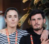 Exclusif - Alizé Cornet et son nouveau compagnon en tribune lors des Internationaux de France de tennis de Roland Garros 2023 à Paris le 30 mars 2023. © Jacovides-Moreau/Bestimage 