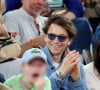 Et le jeune garçon semble aussi fan de tennis que ses parents ! 
Le chanteur Raphael et son fils Aliocha dans les tribunes pour le premier tour des Internationaux de France de tennis de Roland Garros 2024 opposant R.Nadal (Rafa) à A.Zverev, à Paris, France, le 27 mai 2024. © Jacovides-Moreau/Bestimage