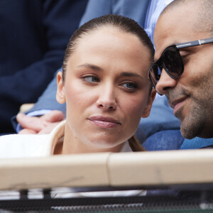 Tony Parker et sa compagne Agathe Teyssier dans les tribunes au même moment dans les tribunes des Internationaux de France de tennis de Roland Garros 2024 à Paris, France, le 2 juin 2024. © Jacovides-Moreau/Bestimage 