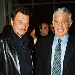 Jean-Paul Belmondo et Johnny Hallyday ont été en couple avec la même femme.
Archives - Johnny Hallyday, Jean-Paul Belmondo lors du vernissage de l'exposition des oeuvres de Paul Belmondo "Le Dessin pour Passion" au Petit Palais à Paris.