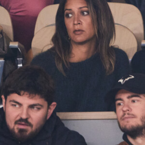 Aurelie Casse et son compagnon dans les tribunes des Internationaux de France de tennis de Roland Garros 2024 à Paris, France, le 1er juin 2024. © Jacovides-Moreau/Bestimage 