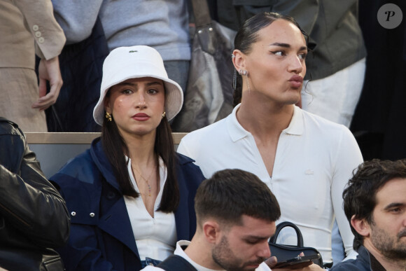 Lénie, Djebril (candidats Star Academy 2024) - Célébrités dans les tribunes des Internationaux de France de tennis de Roland Garros 2024 à Paris le 27 mai 2024. © Moreau-Jacovides/Bestimage 